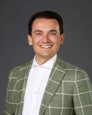 Portrait of Garrett Addington, Owner/Realtor®
