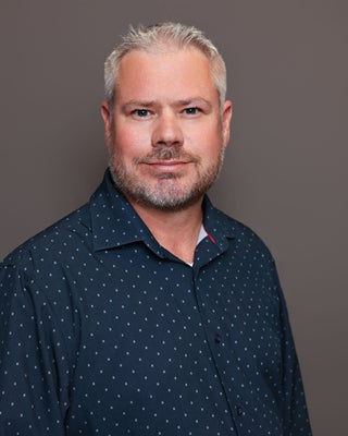 Portrait of Michael Carter, Realtor